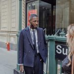 Get help buying a quality suit jacket from an Indiana Image Consultant image shows two people on sidewalk