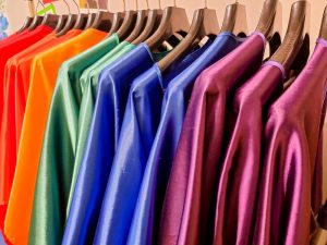 Keep up with fashion trends with help from Personal Image Consultant Beth Divine image shows hanging clothes in multiple colors