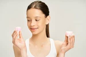 Personal Image Consultant Beth Divine notes that tweens should not use adult skin care products image shows young girl holding pink containers