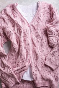 Bold colors and cardigans can help women dress triangle-shaped bodies according to Indiana Wardrobe Stylist Beth Divine image shows pink cardigan