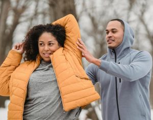 Work with Indianapolis Image Consultant Beth Divine for guidance matching your wardrobe with weight loss image shows man and woman outdoors