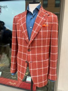 Men should try plaid blazers according to Indianapolis Men's Styling expert Beth Divine image shows rust blazer