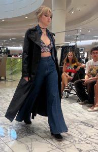 Contact Carmel Personal Stylist Beth Divine for help with your fall style image shows woman walking during fashion show