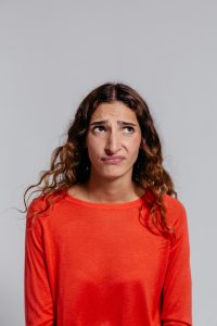 Work with Beth Divine for Carmel Personal Stylist advice and services image shows woman wearing orange shirt